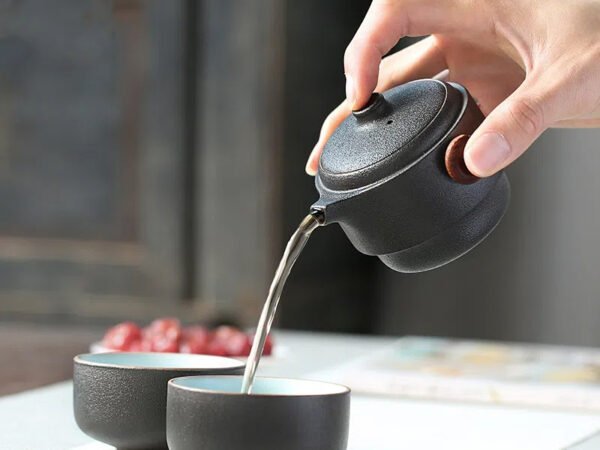 Black pottery quick guest cup one pot two cups household outdoor travel tea set portable bag Kung Fu outdoor portable bubble